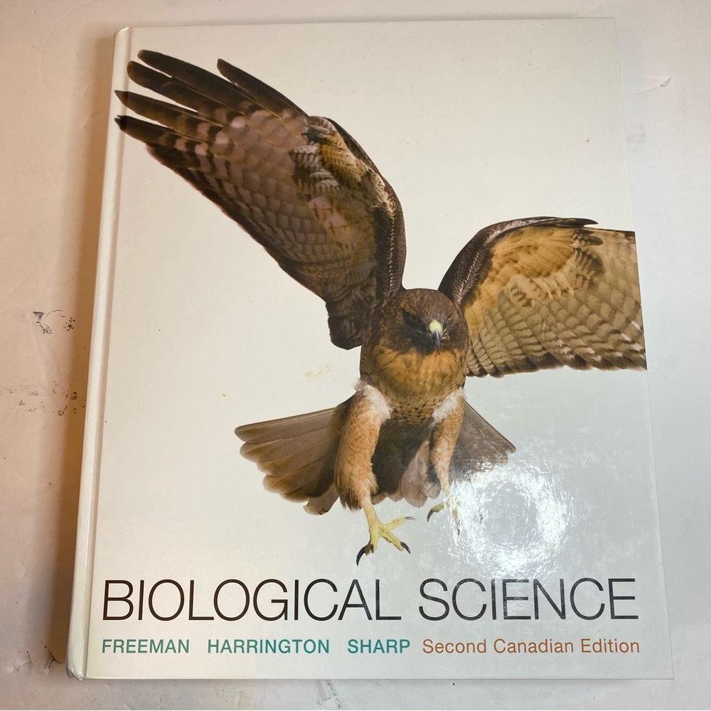 Biological Science Textbook - White Cover with Brown Hawk